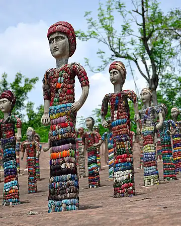 Tall figures at the Rock Garden in Chandigarh made from coloured bangles and broken ceramics